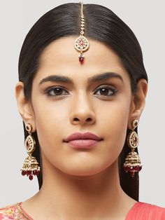 NAZRANAA JEWELS OFFERS A GREAT RANGE OF INDIAN JEWELRY FOR TODAY'S WOMAN WITH THE LATEST DESIGNS. THE BRAND IS COMMITTED TO PROVIDING ITS CUSTOMERS WITH THE HIGHEST QUALITY OF GOODS AND NEWEST DESIGNS. IT IS SUITED FOR A WOMAN WHO IS LOOKING TO STAY DATED WITH THE LATEST TRENDS. RADIANT ANTIQUE GOLD EARRINGS WITH MAANG TIKKA IS A PERFECT ACCESSORY FOR ANY NIGHT EVENT. IT IS SURE TO MAKE YOU STAND OUT IN A CROWDED ROOM. Traditional Indian Jewelry: Slight Color variations possible due to differenc Festive Kundan Earrings For Marriage, Festive Chandbali Earrings For Marriage, Festive Meenakari Earrings For Marriage, Meenakari Chandbali Bridal Earrings, Kundan Chandbali Earrings For Marriage, Traditional Kundan Earrings For Marriage, Traditional Kundan Earrings For Wedding, Festive Chandbali Jhumkas For Wedding, Festive Chandbali Jhumkas For Marriage