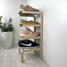 Tired of shoes spilling out all over your floor? This wood and metal shoe rack for entryway can help. Instantly create more space with its 4 tier of shoe storage, so you'll never trip over a rogue sneaker again! So take the hassle out of shoe storage, and say hello to effortless organization. DIMENSIONS: 4 tier shoe stand will work for 5 pairs of shoes Height: 24 inches (61 cm) Length: 11 inches (28 cm) Depth: 11 inches (28 cm) Distance between tiers: 6 inches (15 cm) PRODUCT MATERIAL: - Birch p Wall Mounted Shoe Organizer, Small Vertical Shoe Rack, Wall Shoe Storage, Spinning Shoe Rack, Wooden Shoe Rack, Vertical Shoe Rack, Quirky Shoes, Shoes Organizer, Shoe Stand