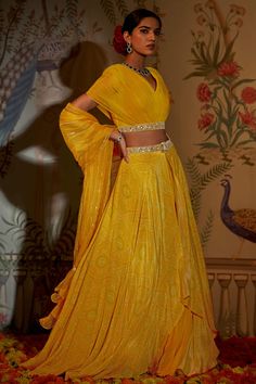 Aayushi Maniar | Yellow Floral Anarkali And Dupatta | INDIASPOPUP.COM Gathered Lehenga, Floral Anarkali, Haldi Dress, Print Lehenga, Bandhani Print, Haldi Outfit, Yellow Lehenga, Draped Sleeves, Drape Sleeves