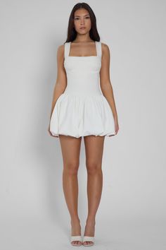 White Mini Dress For Night Out, White Mini Dress With Mini Hem For Night Out, White Mini Dress For Night Out With Mini Hem, Chic White Stretch Mini Dress, White Mini Hem Party Dress, Chic White A-line Mini Dress, Chic White Long Sleeve Mini Dress, Fitted Mini Length Bubble Dress For Cocktail, White Stretch A-line Mini Dress