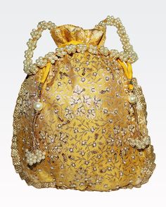 "Mustard Yellow Texture Hand Crafted Potli Bag With Beaded Chain For Women|| Evening Bags, Embroidery Handbag. Designed with the heart with zardozi , pearls work on this mustard yellow colour by using a premium quality of silk fabric. This beautiful Potli or evening party bag are eye catchy and made of premium material. Key Features: **Fabric: Silk **Size: 10\" x 8\" Colour: Mustard Yellow ** Easy to carry, The handle of the purse is beaded with pearl. **Easy to lock and unlock with matching drawstring. Tassels beaded with pearls **Beautiful embroidery detail work crafted with pearls, Zardozi, embroidery at the front side. **This potli purse is good match with your outfits and are superb for wedding and festive parties. **This would be best complement to your designer of any other kind of Festival Beaded Potli Bag As A Gift, Beaded Potli Bag For Festivals And Gifts, Beaded Potli Bag For Festivals Gift, Beaded Rectangular Potli Bag For Festive Occasions, Festive Beaded Rectangular Potli Bag, Beaded Shoulder Bag For Festivals Gift, Festive Rectangular Beaded Potli Bag, Festive Beaded Shoulder Bag As Gift, Festive Beaded Shoulder Bag Gift