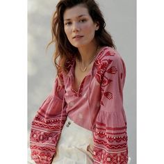 Sophisticated And Sweet, This Peasant Blouse Is A Charming Staple For The Season. Cotton Embroidered Detail Spliced Neck With Tie Pullover Styling Hand Wash Imported Dimensions Standard: 25"L Petite: 23.25"L Plus: 28"L Red Bohemian Embroidered V-neck Top, Chic Pink Blouse With Floral Embroidery, Bohemian Red Embroidered V-neck Top, Red Bohemian V-neck Embroidered Top, Red Tops With Embroidered Sleeves For Spring, Feminine Floral Embroidery Peasant Top, Red Embroidered V-neck Top For Spring, Red V-neck Embroidered Top For Spring, Red Blouse With Embroidered Sleeves