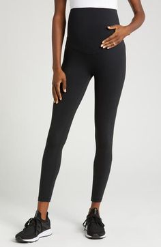 Get ready for your best workout in these full-length leggings crafted with plenty of stretch to keep you moving and grow with you through pregnancy. . 26" length Pull-on style Over-the-bump waistband Drop-in pocket 75% recycled nylon, 25% spandex Hand wash, dry flat Imported Comfort Stretch Leggings With Contoured Waistband For Yoga, Yoga Leggings With Comfort Stretch And Contoured Waistband, Workout Leggings With Comfort Stretch And Contoured Waistband, Sports Leggings With Wide Waistband And Comfort Stretch, Athleisure Leggings With Comfort Stretch And Contoured Waistband, Comfort Stretch Leggings With Wide Waistband For Yoga, Black Comfort Stretch Leggings For Training, Fitted Bump Friendly Leggings, Bump Friendly Fitted Leggings