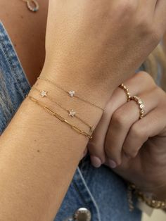 LeMel is known for its dainty gold jewelry! This dainty diamond star bracelet is the perfect addition to any bracelet stack! Layer it with a paperclip chain bracelet or make a statement with some tennis jewelry! Bracelet Stack Tennis Bracelet, Luxury Minimalist Diamond Chain Bracelet, Bracelet Stack Dainty, Paperclip Bracelet Stack, Gold Dainty Bracelet, Dainty Tennis Bracelet, Dainty Gold Bracelet Stack, Dainty Bracelets Gold, Diamond Bracelet Stack