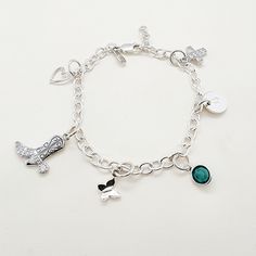 This Silver Charm Bracelet is a stylish and versatile accessory for women. Made of high-quality .925 sterling silver, this bracelet adds a touch of elegance to any outfit. With its simple yet eye-catching design, it is perfect for everyday wear or special occasions. Enhance your style with this must-have piece. The bracelet is 7" long, and charms are sold separately. Trendy Sterling Silver Charms Jewelry, Trendy Sterling Silver Jewelry With Charms, Classic Adjustable Silver Chain Charm Bracelet, Trendy Personalized Silver Bracelet, Personalized Dainty Sterling Silver Chain Bracelet, Trendy Silver Metal Name Bracelet, Dainty Personalized Silver Bracelets, Dainty Silver Stainless Steel Bracelet, Dainty Silver Stainless Steel Bracelets