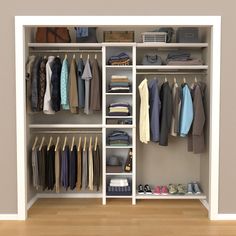 an organized closet with clothes and shoes