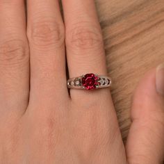 It is a lab ruby ring, octagon cut, measures 7mm*7mm, weight about 1.95 cts. The basic metal is sterling silver and plated with rhodium. To change the metal to a solid gold (white/rose) or platinum is also available, please ask for a quotation if you want. You can also go to my shop Home for more elegant rings: https://www.etsy.com/shop/godjewelry?ref=hdr_shop_menu ruby is birthstone of July. More ruby rings: https://www.etsy.com/shop/godjewelry?ref=seller-platform-mcnav&section_id=20709238 Silver Rings Vintage, Engagement Rings Ruby, Rings Ruby, Elegant Rings, Black Spinel Ring, July Birthstone Ring, Ruby Rings, Engagement Ring Photos, Spinel Ring