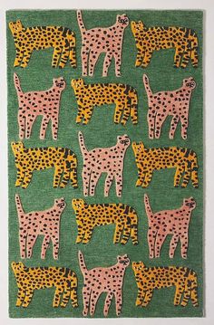 a green background with pink and yellow cheetah on it