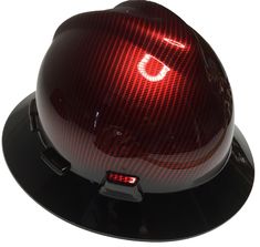 a red light on top of a black hard hat with the letter c in it