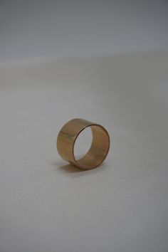 This simple yet bold ring is stunning on its own or layered. The cigar style is classic and timeless. Materials: 14k Gold Fill, Sterling Silver Measurements: This band measures 12 mm wide Timeless 14k Gold Wide Band Ring With Open Band, Timeless 14k Gold Wide Band Ring With Open Design, Timeless Wide Band 14k Gold Open Ring, Timeless Wide Band Open Ring In 14k Gold, Timeless Yellow Gold Wide Band Ring, Timeless Wide Band Ring 14k Gold, Classic Formal Wide Band Ring With Open Band, 14k Gold Wide Band Promise Ring, Minimalist Wide Band With Polished Finish