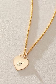 Just as effortless as it is elegant, this stunning necklace features a heart-shaped pendant with gorgeous cursive engraved initial for the ideal finishing touch. * 14k Gold Filled wheat chain * Personalized, laser engraved, 14k Gold Filled 12x14mm heart charm * Length: 18" * 5 days of production | Set & Stones Personalized Alice Necklace at Free People in Gold Elegant Engraved Nameplate Initial Necklace, Elegant Engraved Initial Necklace For Anniversary, Elegant Initial Pendant Necklace For Anniversary, Elegant Silver Heart Pendant Initial Necklace, Elegant Pendant Initial Necklace For Anniversary, Elegant Silver Heart Initial Necklace, Elegant 14k Gold Name Necklace With Heart Pendant, Elegant 14k Gold Heart Pendant Name Necklace, Elegant Engraved Heart Necklace For Mother's Day