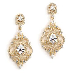 Victorian Scrolls 14K Gold Plated CZ Chandelier Earrings 14K Gold bridal chandelier earrings sparkle with AAAAA quality Cubic Zirconia gems in a fresh vintage design infused modern styling. These romantic Victorian beauties will make a stunning statement with any wedding gown or evening dress adding a serious dose of sophisticated bling. Our jewel-encrusted CZ earrings with distinctive oval-cut stones in a yellow gold setting are a must-have addition to your special occasion wardrobe. 2 1/16" h Bridal Chandelier Earrings, Victorian Accessories, Bridal Earrings Chandelier, Gold Bridal Earrings, Sparkle Earrings, Yellow Gold Setting, Cz Earrings, Cross Earrings, Wedding Earrings