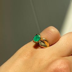 Estate/ vintage 14KT yellow gold ring with genuine, oval cut, emerald and concave wide band. Prong set emerald, and glue has been added to stabilize the stone. Great piece as an engagement/anniversary piece or even as a pinky ring due to its current size. Size 5 Can be resized for an additional fee Weight: 3.2 grams 9mm wide band, tapered back Genuine, bright green, oval-cut emerald measures: 7mm x 4.95mm Abrasions to the stone Estimated 1.00 carat genuine, emerald Stamped 14K and hallmarked Saint Jewelry, Wide Band Ring, Green Oval, Band Design, Wide Band Rings, Fabric Ribbon, Pinky Ring, Engagement Anniversary, Yellow Gold Ring