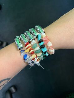 These bracelets are so fun to wear, beautiful and natural crystal chips with an alloy detailed center piece for that touch of wow! Grab one while you can! Crystal Chips, Stone Chips, Natural Gemstone Ring, Czech Crystal, Lava Bead, Pretty Bracelets, String Bracelet, Bead Stringing, Cute Bracelets