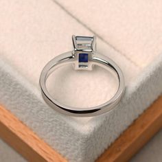 Unique wedding ring blue sapphire ring emerald cut blue | Etsy Formal Square Cut Sapphire Ring, Emerald Cut Tanzanite Sapphire Ring, Blue Sapphire Ring In Emerald Cut Sterling Silver, Blue Emerald-cut Sapphire Ring In Sterling Silver, Blue Sapphire Emerald Cut Promise Ring, Fine Jewelry Sapphire Ring Radiant Cut, Gift Emerald Cut Tanzanite Sapphire Ring, Sapphire Ring With Rectangular Stone For Formal Occasions, Blue Square Cut Sapphire Promise Ring