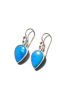 These contemporary genuine blue Turquoise earrings are framed by a smooth sterling silver bezel and finished with handmade French ear wires. If you appreciate the pared-down, simple look of modern design than these earrings are for you. You will wear them again and again. Create a contemporary look for any outfit. The size and the shape make these earrings perfect for the office or casual wear. Cheap Turquoise Minimalist Earrings, Simple Look, Silver Eagle, Silver Eagles, French Wire, Modern Earrings, Turquoise Earrings, Blue Turquoise, Turquoise Jewelry