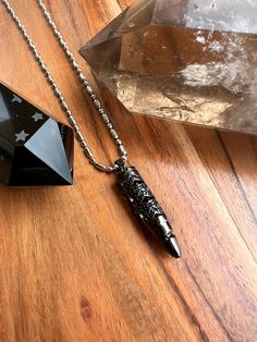 Handmade necklace with stainless steel Bullet pendant and dog tags chain. Bullet Necklace, Tropical Style, Handmade Necklace, Handmade Necklaces, Dog Tags, Stainless Steel, Chain, Tags, Pendant