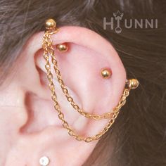 16g 14g Double Chain industrial piercing earring, Cartilages chain 2 ear studs, 316l surgical steel,1&1/2″(38mm), HiUnni Handmade Model is shown wearing 16g 6X8mm bars _ [ Chain Color Options ] Silver, Gold, Rose Gold _ [ Bar, Ball Options] Bar thickness: 16gauge, 14gauge _ One Bar length: 1&1/2″(38mm) 2Bars Bar lengths: 1/4″(6mm), 5/16″(8mm), 3/8″(10mm),1/2″(12mm) _ [ Materials ] Chain, Jump-rings: Ion gold plated 304 stainless steel Barbell: 316l surgical steel _ [ Measurement ]  – Chain thick Chain Industrial Piercing, Cute Industrial Piercing, Chain Industrial, Cartilage Chain, Double Helix Piercing, Ear Piercings Industrial, Industrial Earrings, Industrial Piercing Jewelry, Helix Jewelry