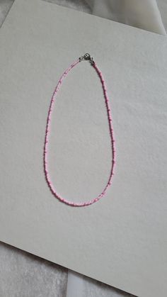 This handmade necklace is from out Minimalist collection - Blossom is one of many colour variations Minimalist Colorful Beaded Choker, Minimalist Beaded Necklace For Gift, Minimalist Single Strand Beaded Necklace, Minimalist Beads For Jewelry Making, Handmade Pink Necklaces For Everyday Wear, Handmade Pink Necklace For Everyday, Handmade Pink Necklace For Everyday Wear, Handmade Minimalist Pink Necklaces, Handmade Everyday Choker Necklace