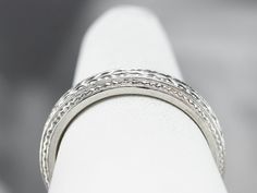 A beautiful platinum band for wearing as a wedding ring, this would make a great stacking ring, as well! The pattern is pretty, what we call a wheat pattern, and is classic for the era. Metal: Platinum Width of Band: 3.8 mm Height off Finger: 2.1 mm Ring Size: 6.50 Marks: "90% PLAT CTI" Stamped on the inside band Platinum Wedding Band, Stacking Bands, Stacking Ring, Stacking Rings, Wedding Ring, A Wedding, Wheat, Wedding Bands, Platinum