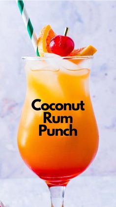 an orange drink in a glass with the words coconut rum punch on it and a cherry garnish