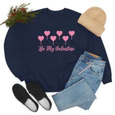 Show your love and affection with our Be My Valentine Sweatshirt, Hearts Lollipop Valentines Sweatershirt. 🎁 Perfect Valentine's Day gift for women, for her, for mom, for daughter, for wife, for girlfriend, for teachers, for couples, for men, for him, for boyfriend, for your significant other, or for yourself. 🌟 Our sweatshirts are super comfortable and cozy. 💘 They are made of a blend of 50% cotton and 50% polyester fibers. 😍 All our sweatshirts are unisex.  ❤️ They run true to size. Please Valentine's Day Cotton Sweatshirt Gift, Valentine's Day Gift Cotton Sweatshirt, Valentine's Day Gift Sweatshirt, Cute Long Sleeve T-shirt For Valentine's Day, Valentine's Day Cotton Sweatshirt With Heart Graphic, Long Sleeve T-shirt With Heart Graphic For Gift, Valentine's Day Gift Top With Long Sleeves, Valentine's Day Long Sleeve Cotton Sweater, Cute Valentine's Day Graphic Print Sweatshirt