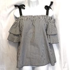 Tempted Los Angeles - Black White Gingham Checks Plaid Off Shoulder Top Blouse Tunic, With Elastic Shoulders, And Thick Ribbons Straps That Tie And Ruffle Sleeves. Size Medium Super Cute Boho Peasant Style! Wear With Casual Or Dressy Outfits. Excellent Condition, Preowned But Never Worn. 20” Across Shoulders, Not Stretched 17” Across Bust, Pit To Pit 23” Length From Top Of Shoulder Strap Ribbon To Bottom Hem. Summer Cotton Houndstooth Pattern Tops, Summer Plaid Blouse For Day Out, Chic Plaid Blouse For Picnic, Summer Casual Houndstooth Top, Casual Houndstooth Summer Top, Casual Houndstooth Top For Summer, Cotton Houndstooth Top For Spring, Cotton Houndstooth Pattern Tops For Spring, Chic Gingham Blouse For Brunch