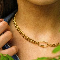 A classic carabiner paired with gorgeous curb chain made from high-quality 18k gold-plated titanium steel 16" in length with a 2" extender Water and tarnish resistant Hypoallergenic Minimalist Cuban Link Necklace With Adjustable Chain For Everyday, Cuban Link Stainless Steel Necklace With Gold Chain, Trendy Everyday Jewelry With Curb Chain, Trendy Stainless Steel Chain Necklace With Lobster Clasp, Metal Chain Necklace For Everyday Use, Trendy Necklaces With Lobster Clasp For Everyday Use, Trendy Necklaces For Everyday Use, Trendy Jewelry With Carabiner Clasp, Trendy Everyday Jewelry With Carabiner Clasp