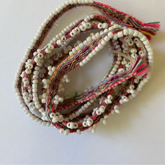 Material: Andean Wool And Beads. Handmade In Cusco, Pisac, Peru. Women Artisans. Women Men | Gender Neutral Bracelet Wrap, Waist Wrap, Head Wrap. New Never Used. Bohemian Multicolor Woven Beads, Multicolor Headwrap For Beach, One Size, Neutral Bracelets, Bohemian Brown Hand-strung Wrap Bracelet, Southwestern Style Multicolor Hand-strung Beads, Southwestern Multicolor Hand-strung Beads, Mens Accessories Jewelry, Women Artisans, Orange And Purple