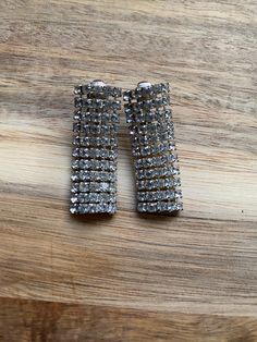 Vintage clip on earrings. Dangling clear rhinestones. Clip on closures. Excellent condition.  Earrings are not intended to be worn while sleeping bathing or swimming. Not recommended for children. See more: https://www.etsy.com/ca/shop/CleverLittleEars Canadian prices include Gst/hst where applicable. Ear Parts, Earrings Dangling, Vintage Clip On Earrings, Jan 17, Vintage Clip, Dangling Earrings, Silver Hoops, Clear Rhinestones, Clip On