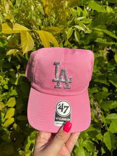 Los Angeles dodgers hat embellished with crystals. Custom Fitted Hats Pink, Bling Dodgers Hat, Casual Rhinestone Cap, Casual Cap With Rhinestones, Casual Snapback Baseball Cap With Rhinestones, Trendy Rhinestone Hats For Spring, Casual Rhinestone Hat, One Size, Casual Rhinestone Hat, One Size Fits Most, Casual Rhinestone Hat One Size Fits Most