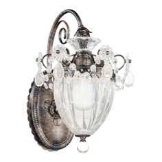 an antique style wall light with crystal drops