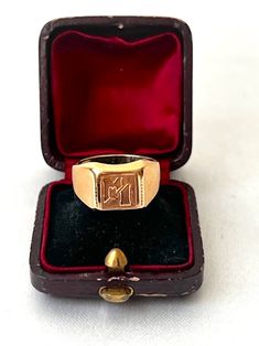 Art Deco French 18k Gold Signet Ring with Initial M. It is hallmarked with a French eagle's head for gold purity (18k gold). The head of the ring measures 0.9 by 0.9mm.  Weight: 4.77 Ring US size: 6.5 (it can be resized upon request)  Very good antique conditions. Thank you for visiting Boudoir Vintage!   Please feel free to contact me for further information or photos.  I offer international shipping. Your item will be packed with extreme care and will be shipped within 3-5 working days. If you are dissatisfied with your item, please feel free to contact me and would be happy to assist.  If you are interested in paying in installments or reserve an item, please send me an inquiry. To continue visiting my shop, please visit  https://www.etsy.com/shop/BoudoirVintageBijoux/ FOLLOW ME on Inst Classic Yellow Gold Signet Ring With Maker's Mark, Classic Hallmarked Signet Ring For Collectors, Classic Hallmarked Signet Ring Collectible, Symbolic Formal Signet Ring Hallmarked, Formal 14k Gold Signet Ring With Hallmarks, Symbolic Hallmarked Signet Ring For Formal Occasions, Formal Symbolic Hallmarked Signet Ring, Collectible Yellow Gold Signet Ring With Initials, Classic Formal Initial Ring With Hallmarks