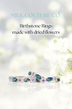 The Blessing & The Heirloom birthstone rings made with dried funeral flowers. The Heirloom also has crushed opal added. Birthstones are amethyst. #breastmilkjewelry #cremationjewelry #memorialjewelry #flowerpreservation #memorial #grief #griefquotes Timeless Sterling Silver Birthstone Ring With Gemstone, Sterling Silver Timeless Birthstone Ring, Heirloom Sapphire Ring With Accent Stones For Promise, Heirloom Sapphire Promise Ring With Accent Stones, Fine Jewelry With Bezel Setting For Promise, Heirloom Promise Birthstone Ring With Center Stone, Heirloom Style May Birthstone Jewelry For Promise, Timeless Stackable Birthstone Rings For Gifts, Timeless Stackable Birthstone Rings As Gift