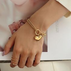 SPECIFICATIONSBrand Name: RamosGender: WomenMaterial: MetalMetals Type: STAINLESS STEELBracelets Type: Chain & Link BraceletsOrigin: Mainland ChinaCN: GuangdongChain Type: Link ChainItem Type: BRACELETSCompatibility: All CompatibleShape\pattern: HEARTModel Number: A-S236Setting Type: Bezel SettingFine or Fashion: fashionStyle: TRENDYFunction: Mood TrackerChoice: yessemi_Choice: yes●The material of the product is made of stainless steel.Will not fade after contact with water.Will not darken.Prevent allergies.●Apply to Occasion: Party, wedding ,engagement, gift for friend Mom sisters wife.●The package will not contain any information about our store and product prices.If you have any questions, please contact customer service. Luxury Personalized Stainless Steel Jewelry, Elegant Heart Shaped Chain Bracelet, Cheap Gold Charm Bracelet For Mother's Day, Modern Luxury Gold Charm Bracelet, Elegant Bracelets For Mother's Day At Affordable Prices, Luxury Modern Name Bracelet For Everyday, Luxury Personalized Gift Jewelry For Women, Luxury Jewelry As Mother's Day Gift For Mom, Luxury Modern Charm Bracelet