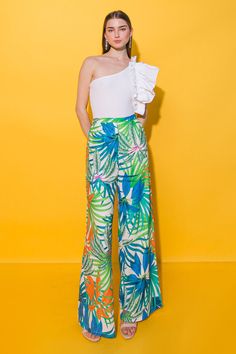 These PRETTY ON POINT WOVEN PANTS are perfect to create a stylish and comfortable look. Crafted from lightweight, printed woven materials, they feature a wide leg and an elasticized waistband for extra comfort and a flattering fit. With a fashionable and functional design, these pants are great for any style and occasion. Details Self: 100% Polyester Size & Fit - Model is 5`8" And Wearing Size Small - Measurements Taken From Size Small - Approx. Length: 45" Printed Wide Leg Summer Pants, Green High Waist Printed Bottoms, Printed Wide-leg Pants For Vacation, Printed Wide-leg Summer Pants, Printed Wide-leg Pants For Summer, Green High-waisted Printed Bottoms, Trendy Green Printed Pants, Vacation Wide Leg Printed Pants, Summer Wide Leg Printed Bottoms