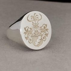 "Your custom solid sterling Silver ring will be made on your order, customize this Coat of Arms and your logo on this collection! A beautiful symbol that will fit your hands and style. perfect gift for anniversary, special dates and any date you can imagine can be Personalized. Different colors are silver, gold, rose gold. White gold and 24K gold options will never tarnish and last decades. Please contact me if you are interested in my jewelry. >ABOUT ME: I have 35 years of experience in making custom handmade silver and gold jewelry, including custom engraved Signet rings My childhood kind of allowed me to live among precious metals and gems pretty much I opened my workshop back in 1986 Never got bored of making Personalized gifts, birth flower rings, engagement rings with real diamonds F Timeless Engraved Ring With Engraving Option As Gift, White Polished Signet Ring As A Gift, Timeless Engraved Ring As Gift, Timeless Engraved Ring For Gifts, White Polished Finish Signet Ring As Gift, White Engraved Signet Ring For Anniversary, Timeless Signet Ring With Engraving Option As Gift, Engraved Sterling Silver Ring With Initials In White Gold, Sterling Silver Oval Signet Wedding Ring