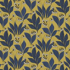 a blue and yellow floral pattern on a mustard background with small white flowers in the center