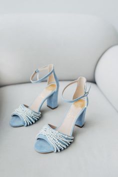 'Jackie' wedding shoes are handcrafted in something blue genuine suede with pearl embellishment on the toe and pearl charm on the ankle strap. The block heel is 9 cm / 3.5 inches high and leather cushioned insoles ensure comfort for all-day wear. The pearl strands are free-floating and can be rearranged to your liking. Inside there is a soft memory foam insole, which gives a feeling of additional comfort when walking. Tunit outsole is made of a mixture of leather chips and rubber, it's more wear-resistant than leather and more durable. Also, we use soft natural upper materials that wear well and take the shape of the foot. You can customize shoes' embroidery, heel, color etc. - we offer a lot of options.  OUR SHOES ARE MADE-TO-MEASURE ONLY. We start to craft the shoes only after you place Blue Wedding Sandals, Sandals With Pearls, High Block Heels, Blue Wedding Shoes, Something Blue Wedding, Bridal Sandals, Wedding Sandals, Womens Wedding Shoes, Leather Cushion