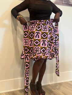 Embrace Africa's bright energy with this gorgeous Ankara wrap skirt. This adaptable item, made of high-quality Ankara cloth, allows for unlimited style options. Whether you like the casual elegance of a maxi, the whimsical appeal of a mini, or the graceful flow of a midi, our wrap skirts are suitable for every style and occasion. The wrap shape offers a great fit for all body types, and the bright Ankara prints lend an exotic flare. Our Ankara wrap skirts are the definition of easy style, whether on a casual day or at a formal event. Discover the charm of African fashion and upgrade your wardrobe now. Features ✨Wrap style, versatile length options, vibrant Ankara prints, comfortable fit. ✨Perfect for: Casual wear, special occasions, office attire. ✨Pair with a simple top and statement acce Fitted Multicolor Ruffled Mini Skirt, Flowy Multicolor Lined Wrap Skirt, Multicolor Fitted Long Wrap Skirt, Flowy Multicolor Tiered Wrap Skirt, Multicolor Flowy Tiered Wrap Skirt, Multicolor Long Lined Wrap Skirt, Multicolor Relaxed Flared Wrap Skirt, Multicolor Tiered Wrap Skirt With Lining, Multicolor Tiered Lined Wrap Skirt