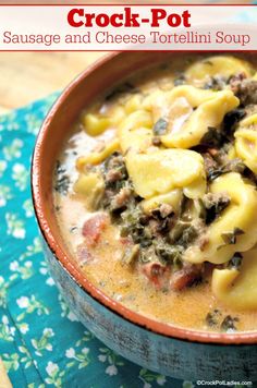 a bowl of crock pot sausage and cheese tortellini soup on a table