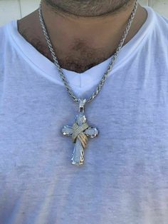 "Men's Custom Made Super Iced Out HEAVY Cross Pendant! Solid 925 sterling silver We have 3 styles! Rhodium finished, two-toned, & 14k yellow gold finished! Color lasts many years!! Measures roughly 2.5\" by 1.5\" ..weighs roughly 25 grams 200 micropaved handset simulated diamonds (CZ) for a total of 3ct! 100% 925 silver...not plated or filled...will NEVER TARNISH OR CHANGE COLOR LISTING IS FOR PENDANT ONLY, CHAIN NOT INCLUDED Bale fits most chains up to 8mm thick!" Engraved White Gold Stainless Steel Jewelry, Fine Jewelry In White Gold With Shiny Finish, Sterling Silver Cross Jewelry With Diamond Cut, Yellow Gold Sterling Silver Jewelry With Rope Chain, 14k Gold Cross Jewelry In White, White Diamond Jewelry With Rope Chain, White 14k Gold Cross Jewelry, Silver Cross Jewelry With Diamond Cut, Silver Diamond Cut Cross Jewelry