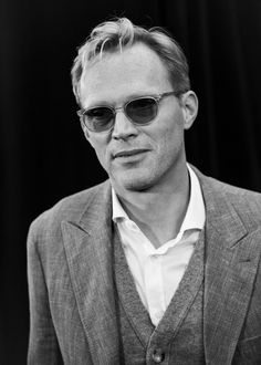 black and white photograph of a man wearing sunglasses