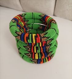 Bracelets | Custom Bracelets | Mother's Gift | Gift Idea | Bangles | Unique Gift | Bracelets For Women | Yoga Bracelets | Daughters Gift These superbly crafted Zulu beaded bracelets are made of fine beads which can be worn in any occasion. Available in different colors.    The price is for 1 piece/bracelet.   For more beaded bracelets ,please click below link: https://www.etsy.com/shop/NanacraftsKE?ref=shop-header-name&listing_id=775922675&from_page=listing&section_id=23600491 Feel free to send Hand Wrapped Green Beads As Gift, Hand Wrapped Green Beads For Gift, Green Bangle Friendship Bracelets, Green Stretch Bangle Bracelet With Colorful Beads, Green Stretch Bangle With Colorful Beads, Green Bangle Bracelets With Colorful Beads, Green Bangle Bracelet With Colorful Beads, Green Hand Wrapped Beaded Bracelets As Gift, Green Hand Wrapped Beaded Bracelets