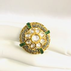 Gray Meenakari Emerald Kundan Adjustable Ring/ Amrapali Rajwadi Ring/ Sabyasachi Ring/ Statement Ring/ Indian Wedding Kundan Ring Description: Made in Brass with Kundan, Cubic Zirconia Stones and Emerald Green Semi-precious stones Handmade Kundan Jadau Statement Ring Width: Approx. 1.25 Inches Adjustable Ring Lightweight Ring Suitable for any traditional or contemporary occasion Jaipuri/Rajwadi Jewelry Check our complete Kundan and Cubic Zirconia Rings collection here: https://www.etsy.com/shop/ Luxury Elegant Meenakari Rings, Gold Meenakari Rings For Festive Occasions, Gold Rings With Meenakari For Festive Occasions, Festive Gold Ring With Meenakari Detail, Festive Gold Ring With Meenakari, Traditional Yellow Gold Emerald Ring Gift, Traditional Yellow Gold Round Emerald Ring, Traditional Yellow Gold Emerald Ring, Yellow Gold Meenakari Ring Jewelry