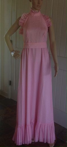 Vintage pink polka dots maxi dress tag reads Bianchi Boston. It is a beautiful dress it is light weight , delicate material, it is fully lined in soft pink satin material. The dress has one ruffle on the him of the dress , a round back and neck . The dress has a belt from same material , it closes with eye and hook . The dress comes with a 55 inch triangle scarf same as the dress . The dress is in good vintage condition no spots or tare . Measurements  Length from neck - 57 inches  Waist- 28 inc Pink A-line Maxi Dress For Daywear, Pink Floor-length Maxi Dress For Daywear, Pink Full Length Maxi Dress For Spring, Vintage Pink Maxi Dress For Daywear, Maxi Halter Dress, Polka Dot Maxi Dresses, Triangle Scarf, Maxi Robes, Satin Material