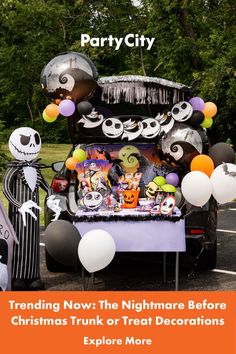 a car decorated with halloween decorations and balloons