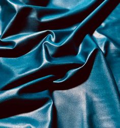 a close up view of a blue fabric