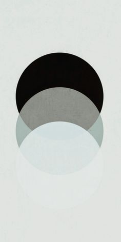 an abstract black and white photo with two circles in the middle, on a light gray background