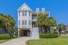 this is an image of a beach house in the florida keys with stairs leading up to it